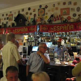 People enjoying cocktails at Lolas Bar Marbella